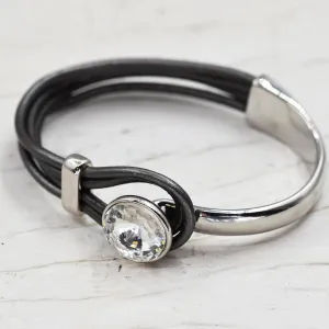 Leather bangle with central crystal stone clasp feature