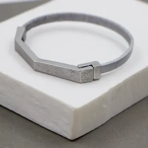 Leather bracelet with matte rhodium part