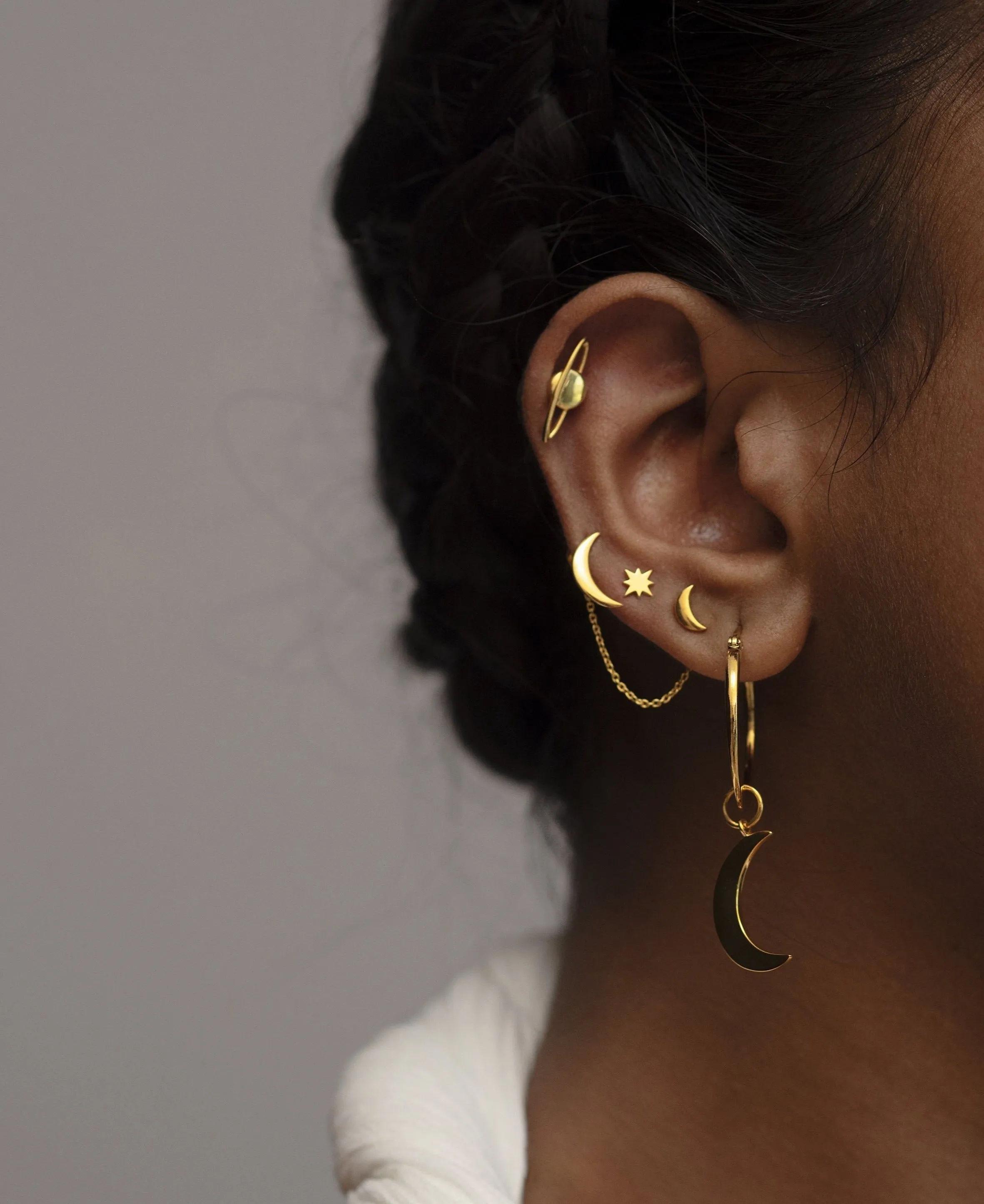 Otherworldly Planet Studs in Silver Tone